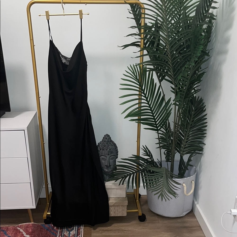 Elegant Black Women's Dress with lace detail and high slit
